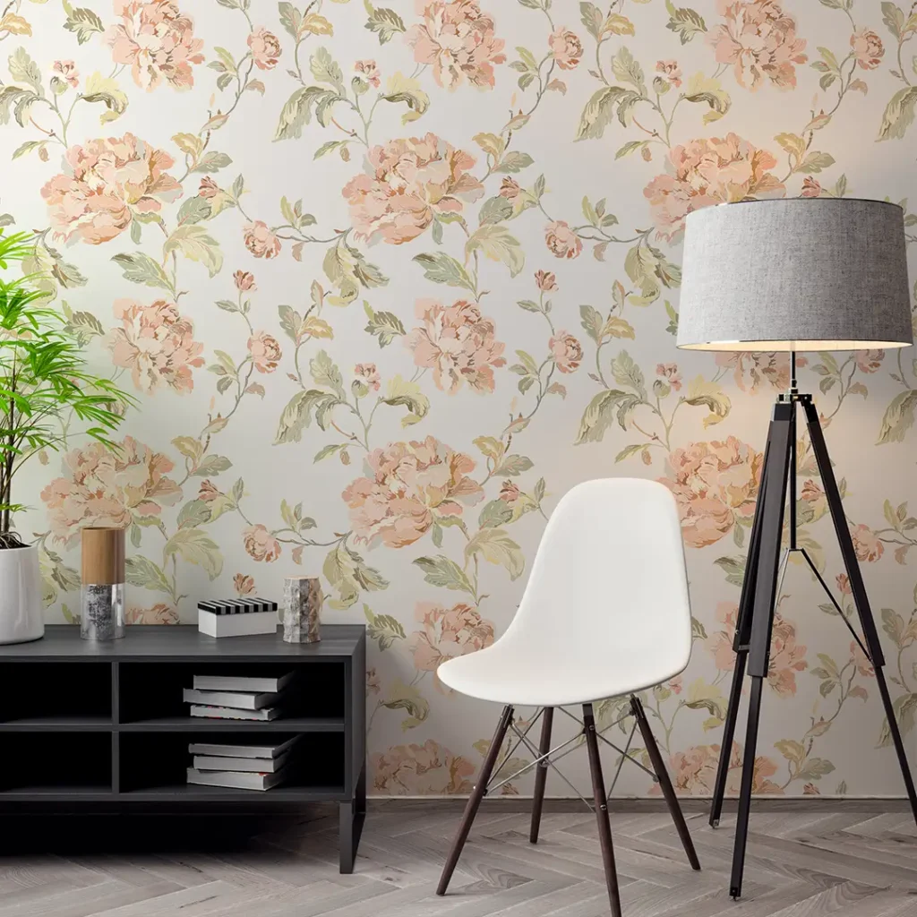 A close-up of Blossom Canvas vintage floral wallpaper with dusty pink and sage green flowers.