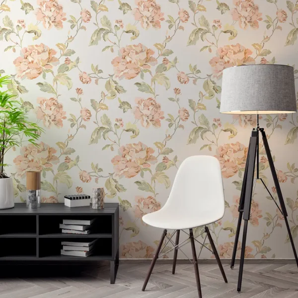 A close-up of Blossom Canvas vintage floral wallpaper with dusty pink and sage green flowers.