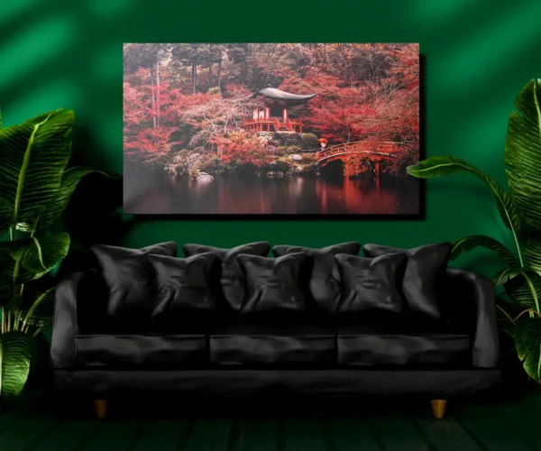 A serene Japanese autumn landscape with a red temple and bridge over a tranquil pond.