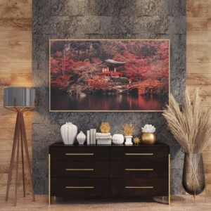 A serene Japanese autumn landscape with a red temple and bridge over a tranquil pond.