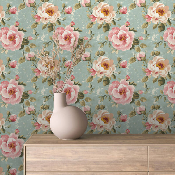 English Rose Manor Vintage Floral Wallpaper. A room features a large-scale vintage floral wallpaper with pink roses on a dusty teal background.