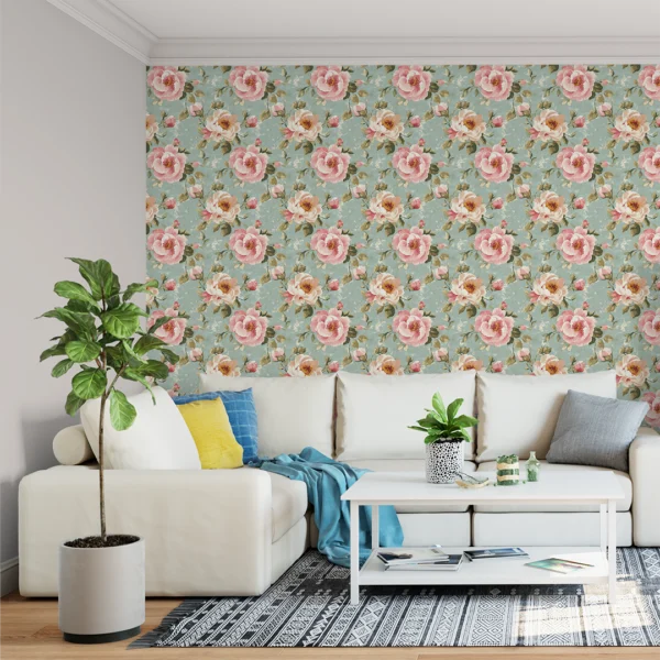English Rose Manor Vintage Floral Wallpaper. A room features a large-scale vintage floral wallpaper with pink roses on a dusty teal background.